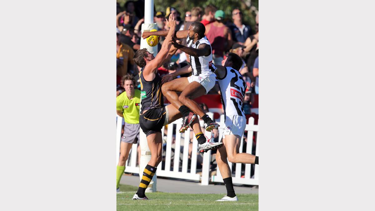 Click or flick across for more action photos in sport. Pictures: JOHN RUSSELL, MATTHEW SMITHWICK, KYLIE ESLER and PETER MERKESTEYN