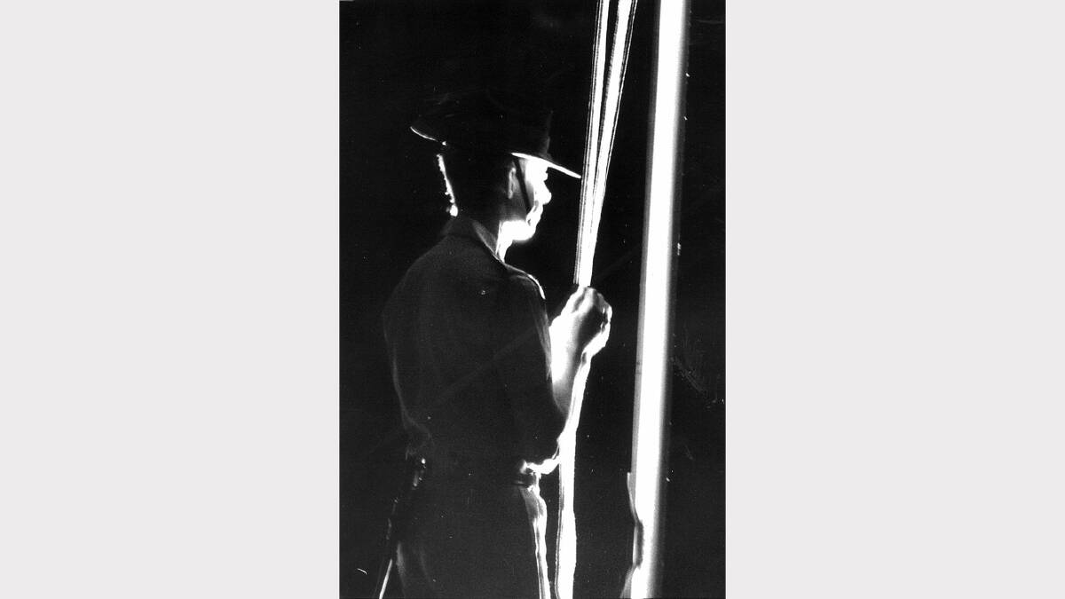 A soldier stands at post during the 1989 dawn service at the Albury Monument.
