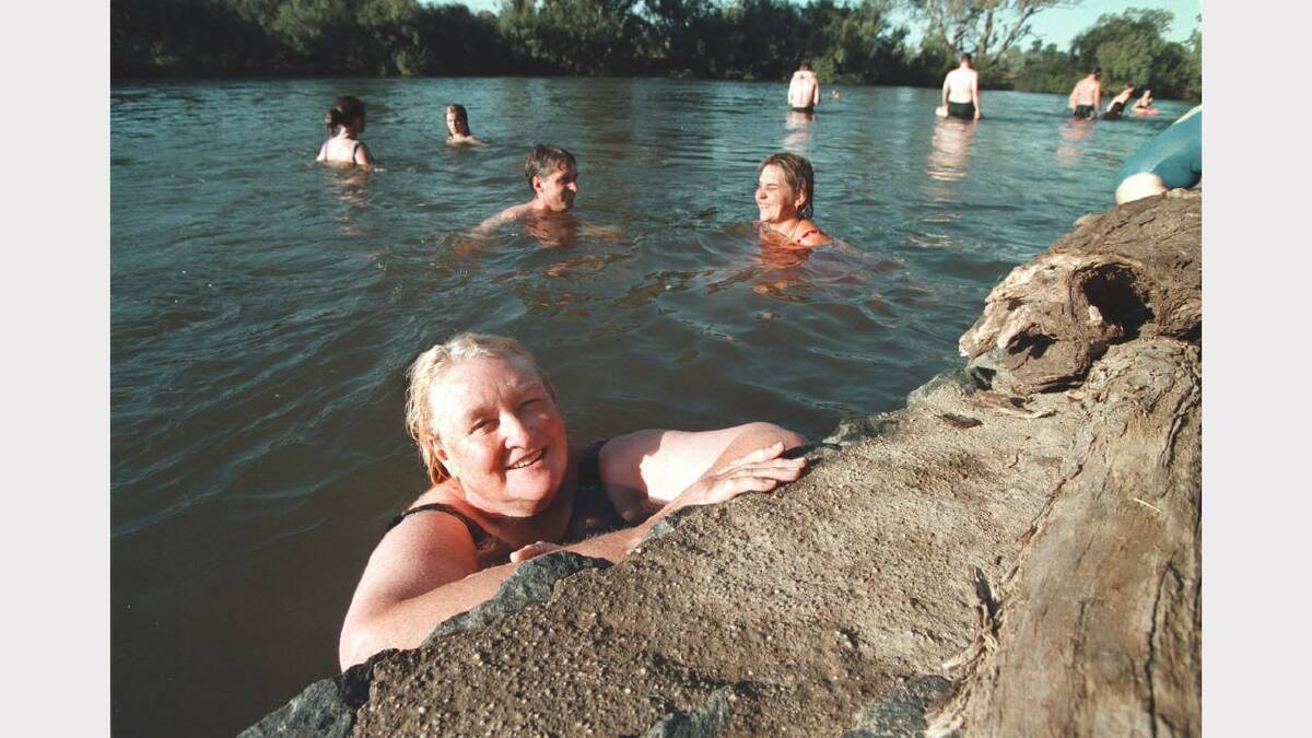 Betty Kamevaar takes a quick dip at Albury's Noreuil Park. Picture: PETER BATSON