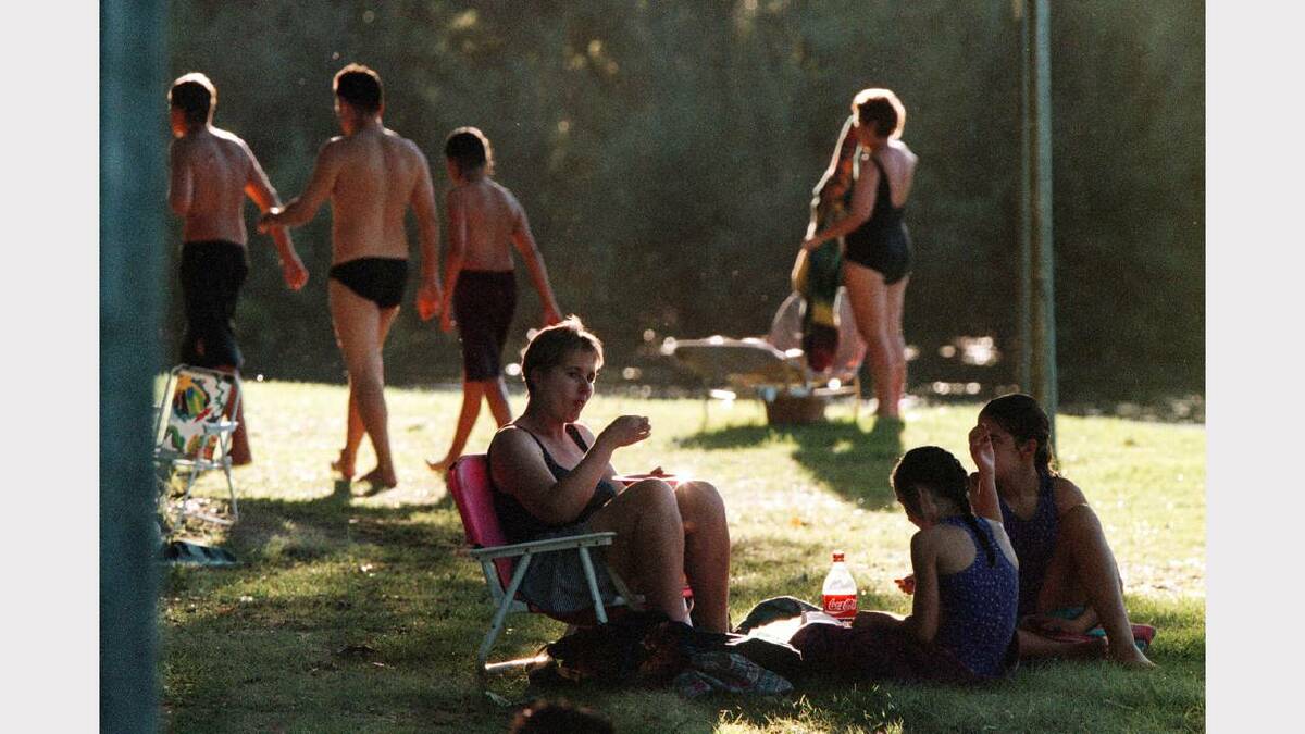 Patrons enjoying a summer evening at Albury's Noreuil Park. Picture: PETER BATSON