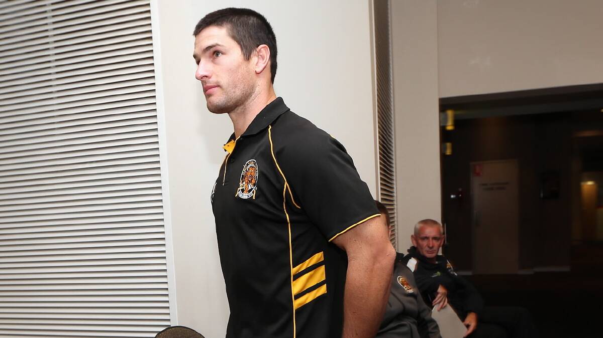 Albury footballer Joel Mackie makes his way into last night’s Ovens and Murray tribunal hearing. Picture: JOHN RUSSELL