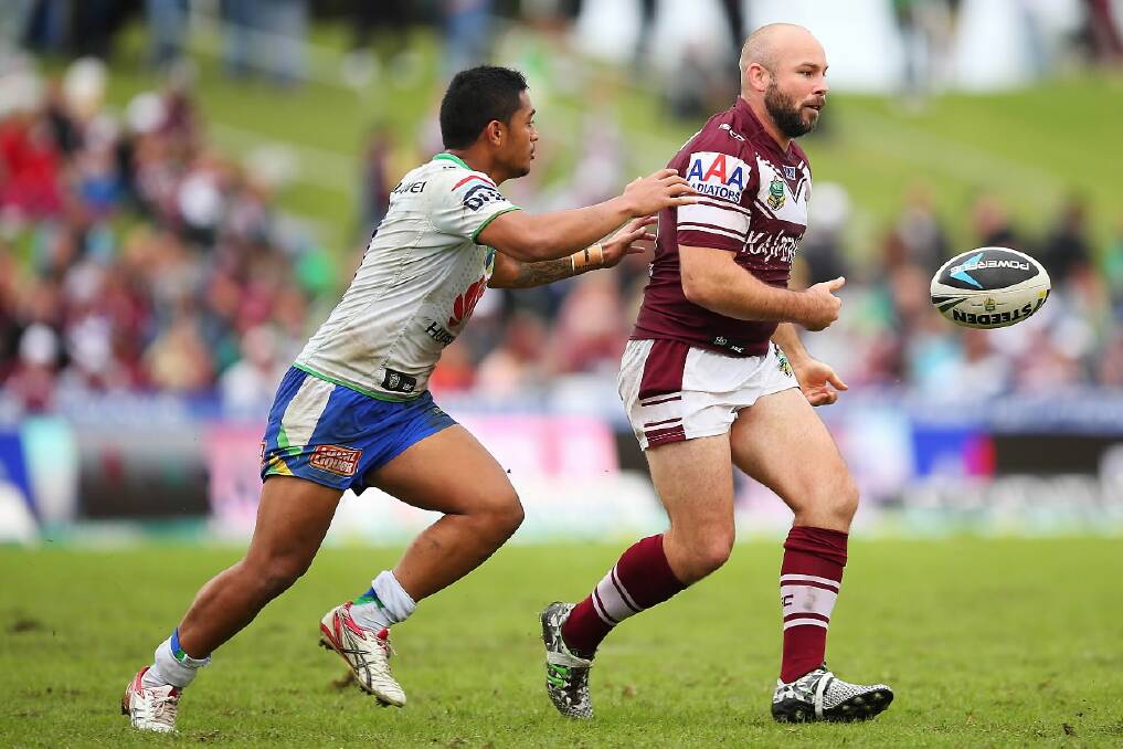 Manly's Glenn Stewart passes the ball during the round 8 NRL match between the Sea Eagles and the Canberra Raiders last year. Picture: GETTY IMAGES