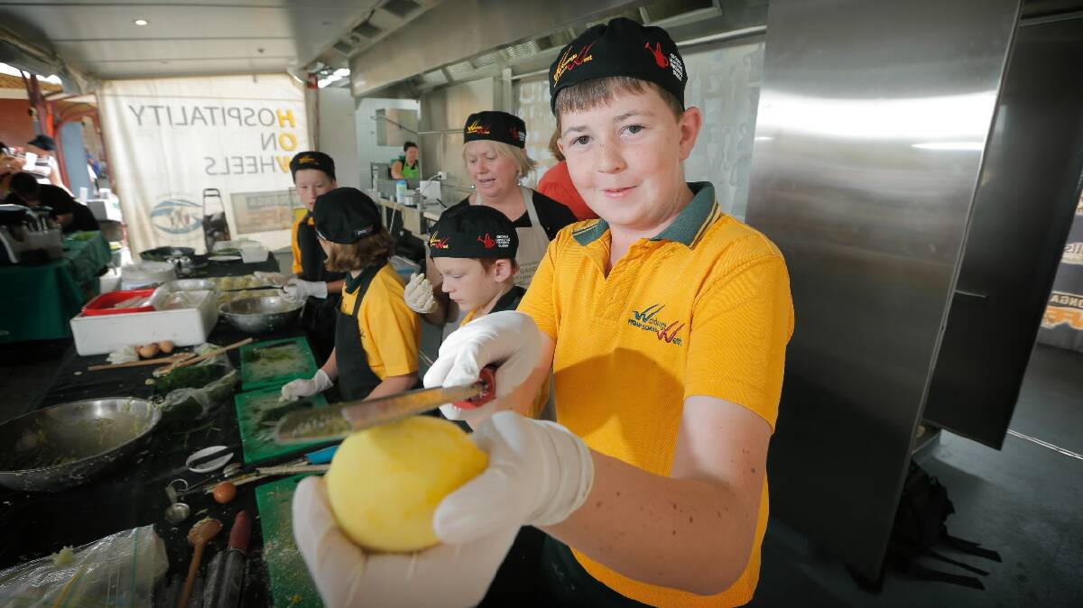 Aiden Fulford, 12, of year 6, zesting a lemon for the zucchini & haloumi fritters. Picture: TARA GOONAN