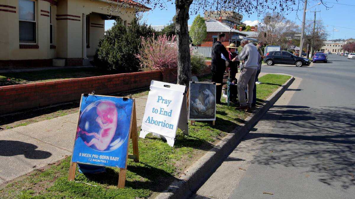 Anti-abortion advocates outside the Englehardt Street clinic.