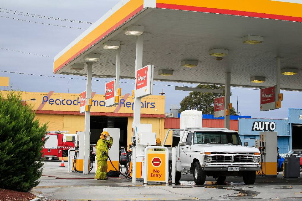 CFA and police crews attend to a leaky gas pump at the Shell service station in Wodonga. Picture: DYLAN ROBINSON