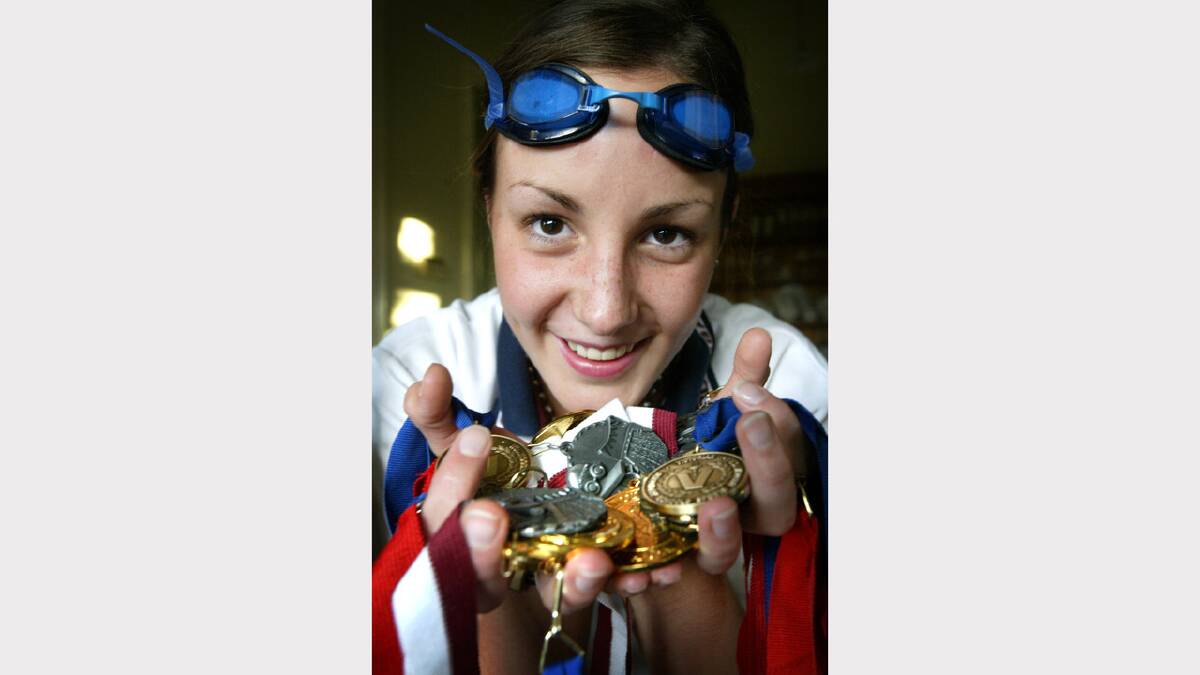 Kim Bryan, 17, is currently in Australia on exchange and has been cleaning up the medals in the pool.
