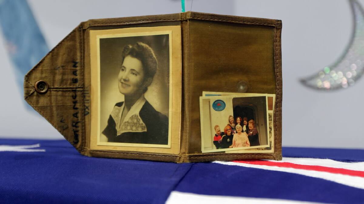 Mrs McLean’s coffin was draped with the Australian flag and topped with special photos. Picture: PETER MERKESTEYN