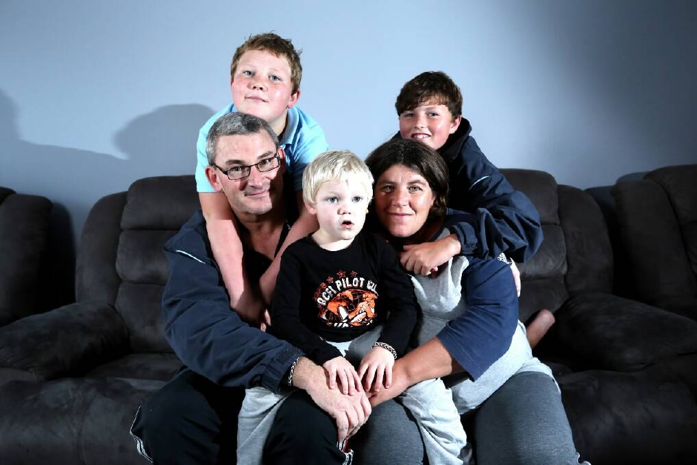 Mark Sayers and his wife Tracy, and their children Michael, 9, William, 3, and Mitch, 11. Picture: MATTHEW SMITHWICK