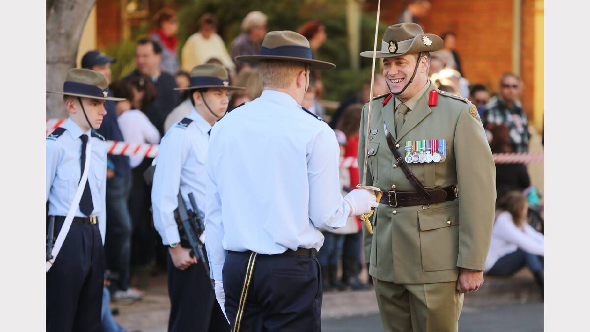 Col. Todd Ashurst inspects the honour guard prior to the march this morning.