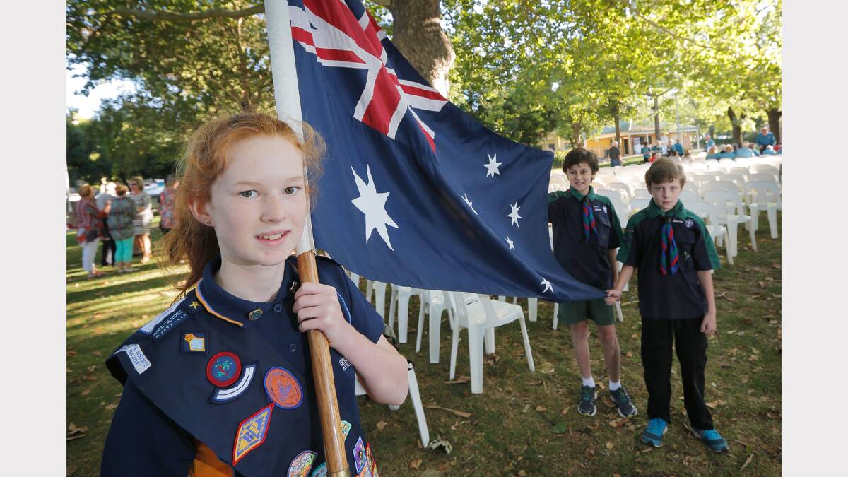  L-R: Jessica Lewis, 13, of the Monak Guides, Liam Jones, 12, and Riley Jones, 10, of the 3rd/4th Scout Group, were part of the flag raising ceremony.