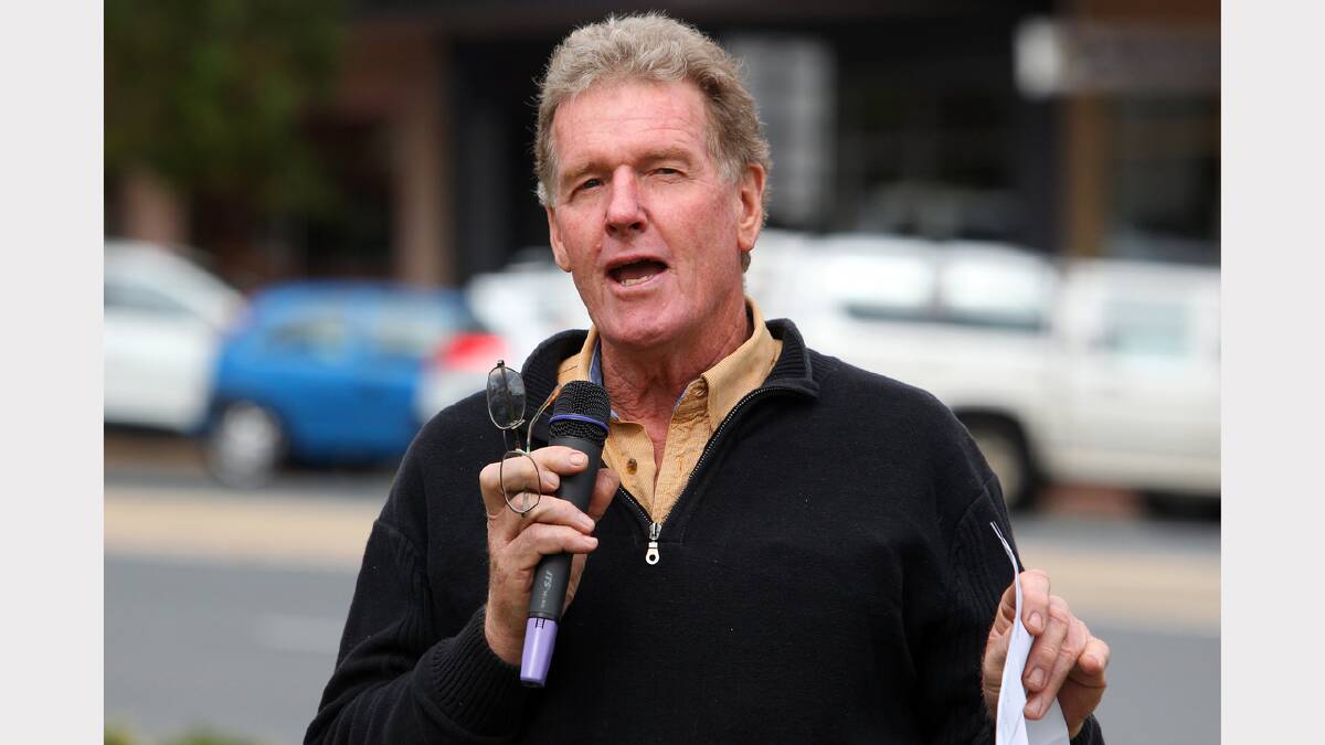 Glen Wilson, climate change activist, speaks at the March in March protest objecting to the Abbott Government, held in Woodland Grove, Wodonga.