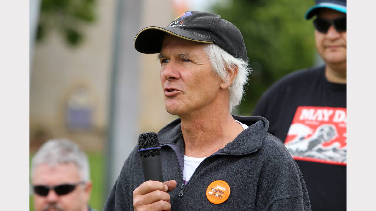 Chip Eling, secretary of the North East Border Trades and Labour Council, speaks at the March in March protest objecting to the Abbott Government, held in Woodland Grove, Wodonga.