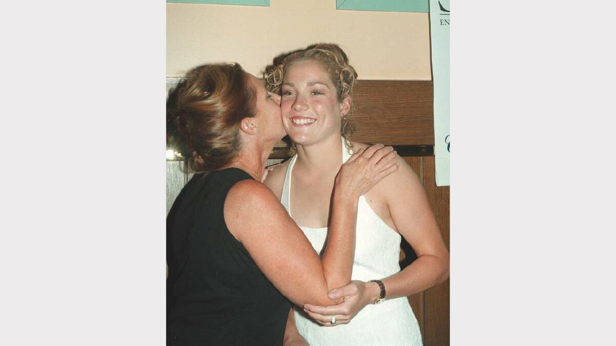 Festival of Sport award winner Rebekah Keat gets a congratulatory kiss from her mother Ruth. Picture: RAY HUNT