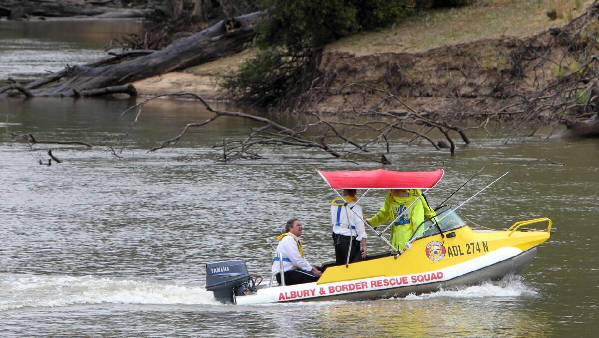 NSW Police detectives aboard a VRA boat after the search for Jovica Djukic's body. 