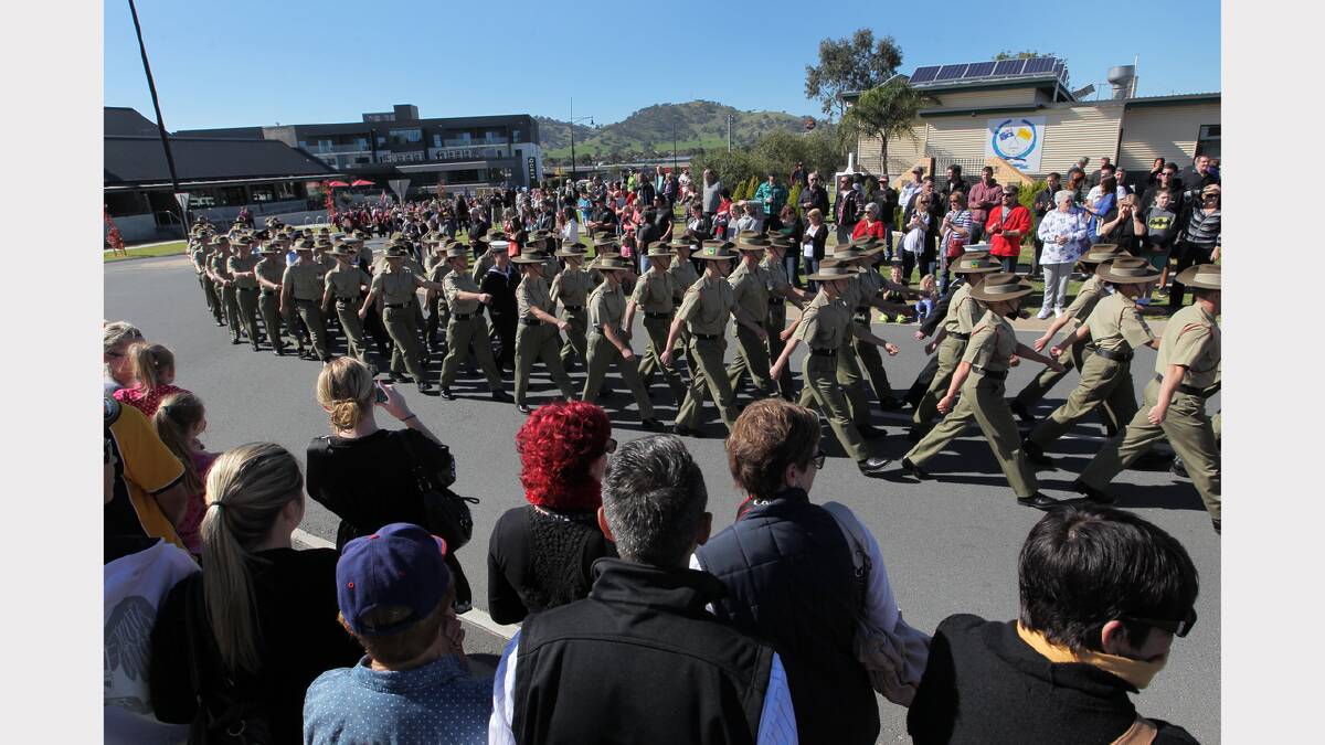 Wodonga Anzac Day parade. Soldiers march past the crowd into Havelock St.