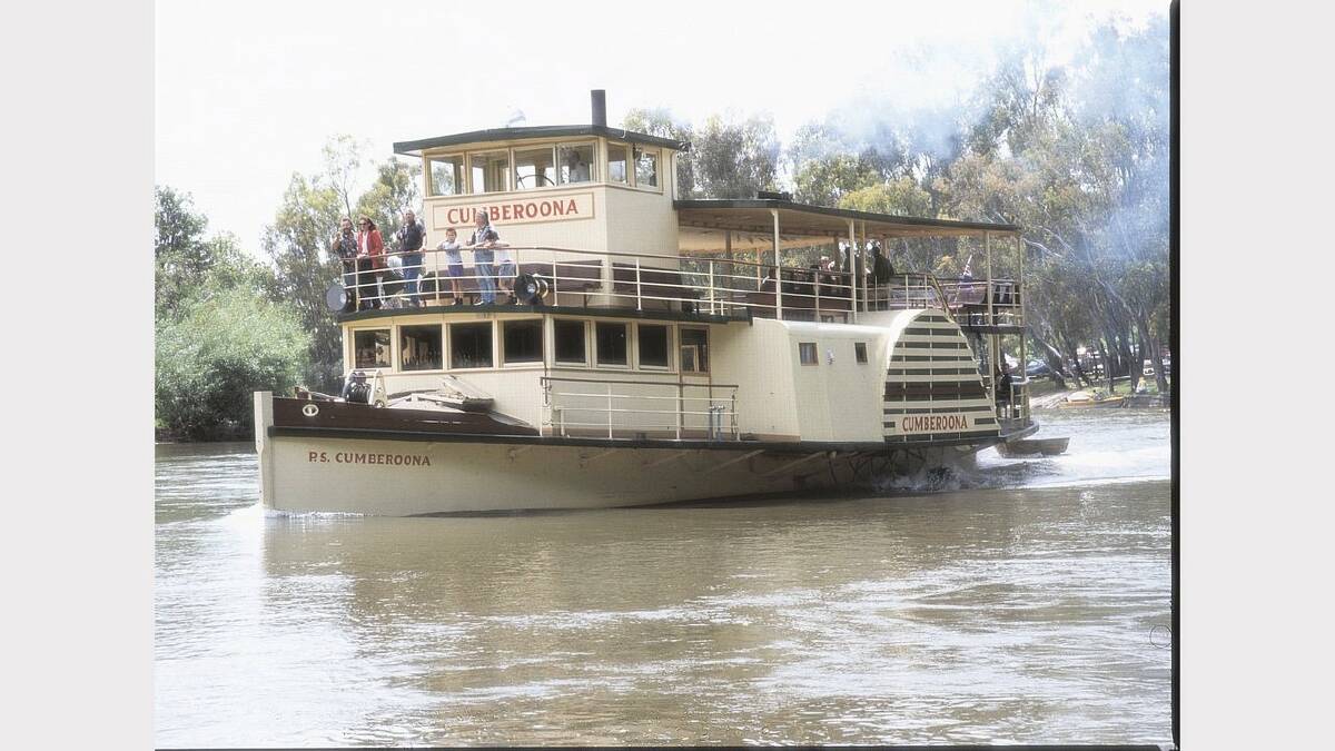 The paddlesteamer Cumberoona heads down the Murray River. 