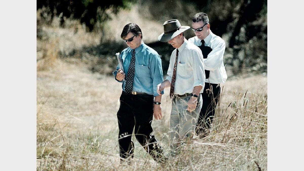Wodonga  -  Water Parklands. Homicide detectives from Melbourne investigate the crime scene of where the body of Aubrey Maurice Broughill was found.  (L TO R) Detective Sgt Paul Ross, Detective Sen Sgt Lucio Rovis, Detective Michael O'Neill. Picture: KATE GERAGHTY