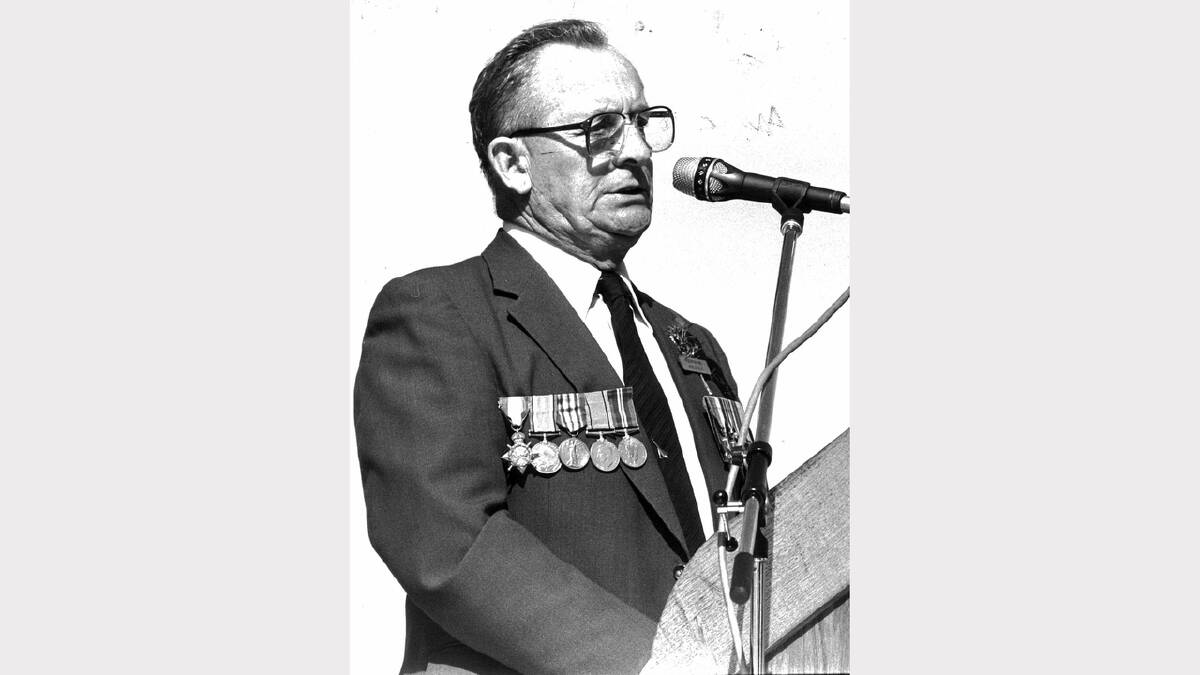 The RSL's Rex Chamberlain addresses the crowd during the 1988 service.