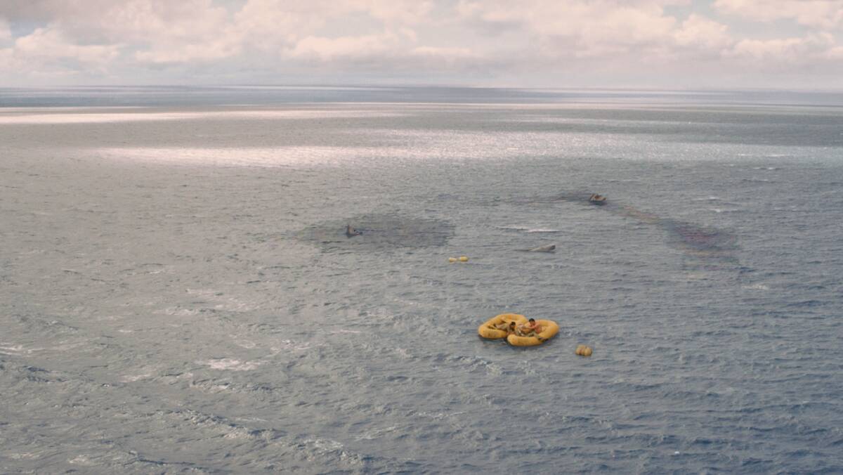 A scene from Unbroken showing the drifting raft: filmed off Peel Island. Photo Universal Pictures. 