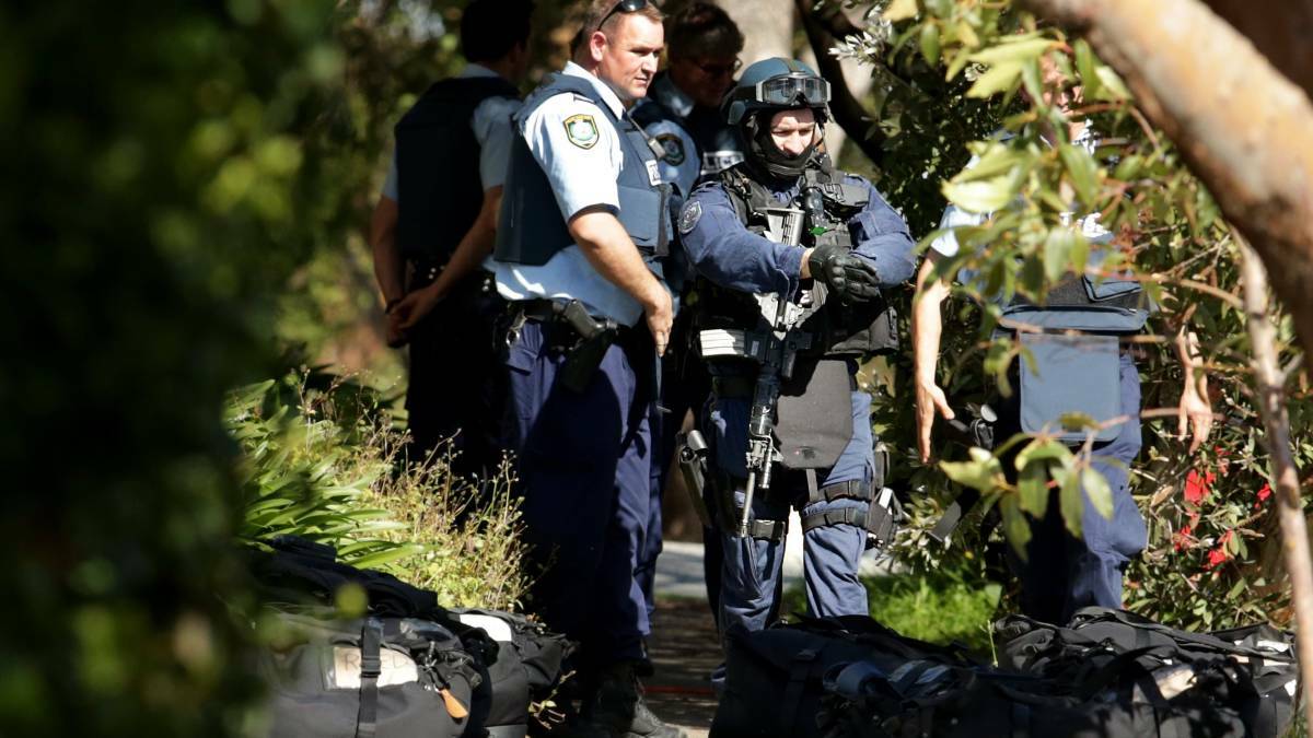 Police were called to Denison Street at Hamilton following reports a man was waving a sword and pistol in the backyard of his premises.