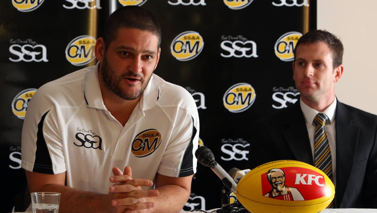 Brendan Fevola O&M general manager Aaron McGlynn at the press conference announcing Fev's role as interleague coach. 