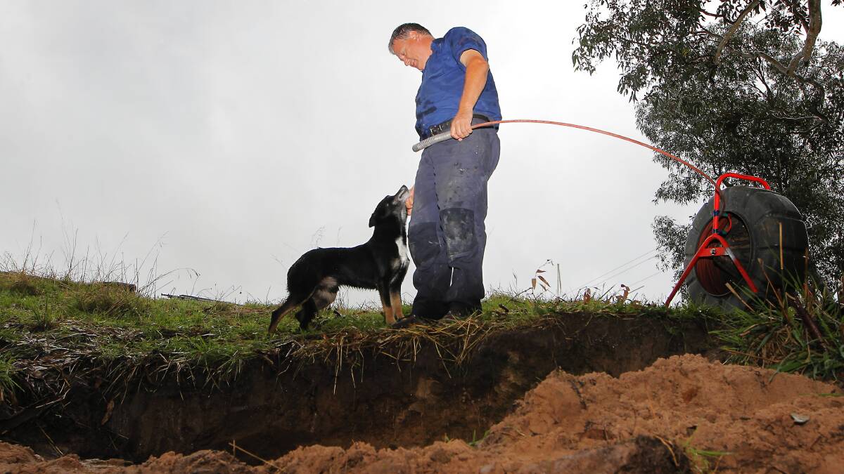 Plumber Gary Tonkin used a four-metre cable with a camera on the end to find Lucky and shine a light to help him escape. Pictures: DYLAN ROBINSON