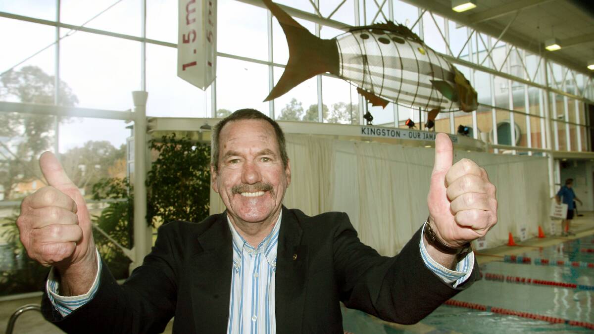 2006 - Howard Butterworth with the Commonwealth Games fish he named ''Kingston''. Picture: RAY HUNT