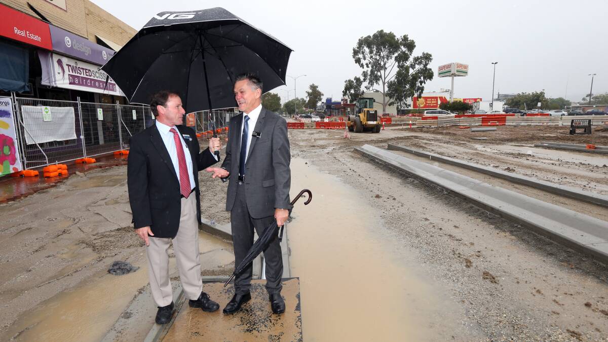  Wodonga Mayor Rod Wangman and director of planning and infrastucture Leon Schultz talking about where the pedestrian crossing are going to go. Picture: PETER MERKESTEYN