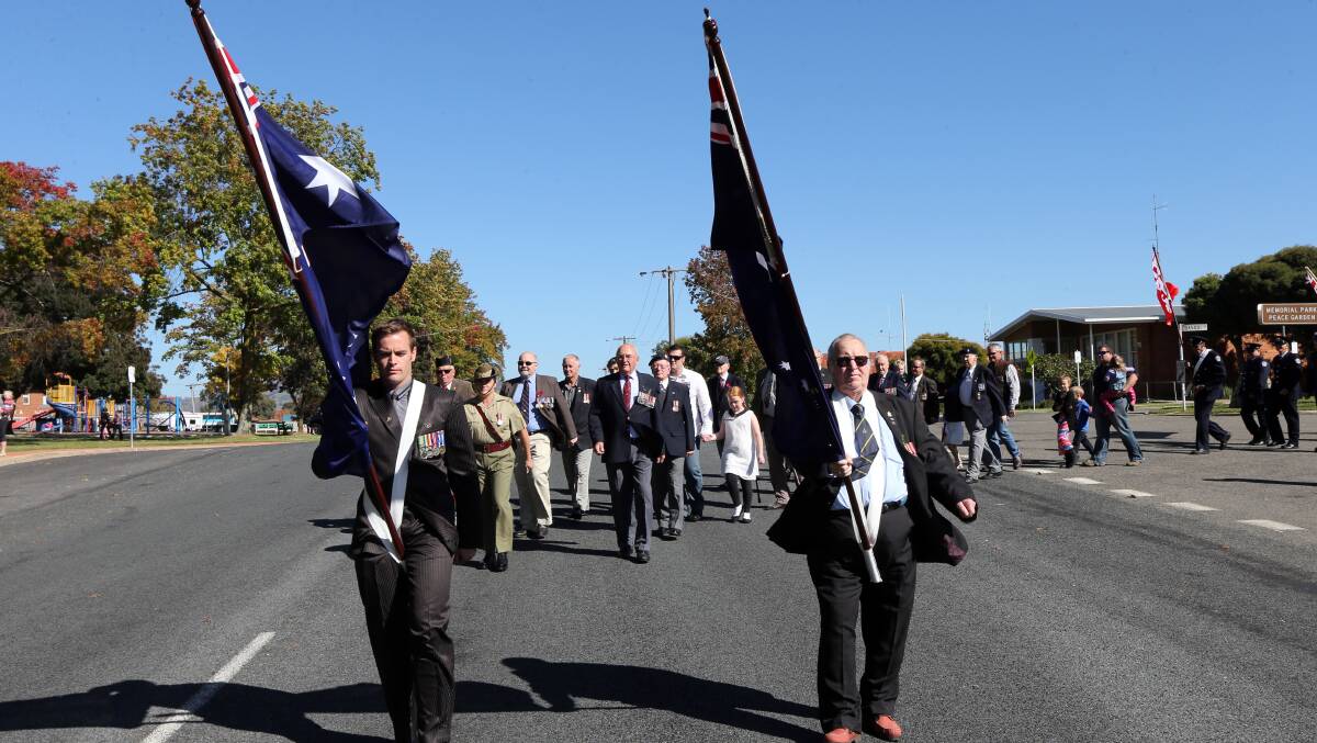 The march at Tallangatta was lead by Matthew Cleland and Stephan Bornholm. Picture: PETER MERKESTEYN