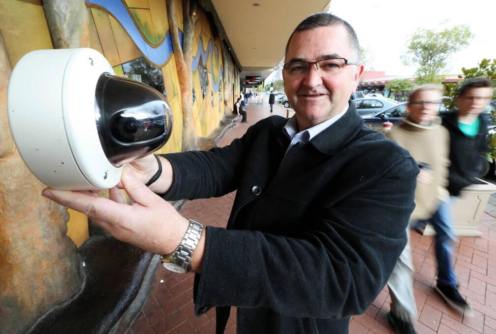 Wodonga Chamber of Commerce manager Bernie Squire with one of the cameras to be installed. Picture: JOHN RUSSELL
