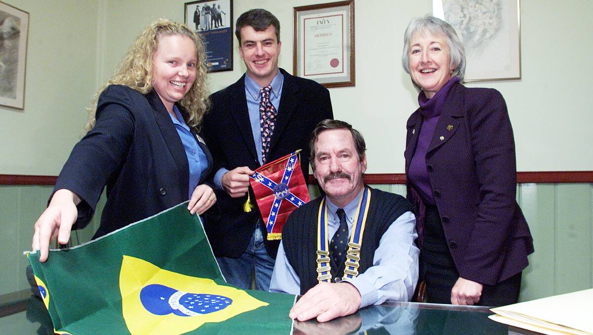 2001 - Howard Butterworth with Rotary members who travelled overseas. Picture: PETER MERKESTEYN