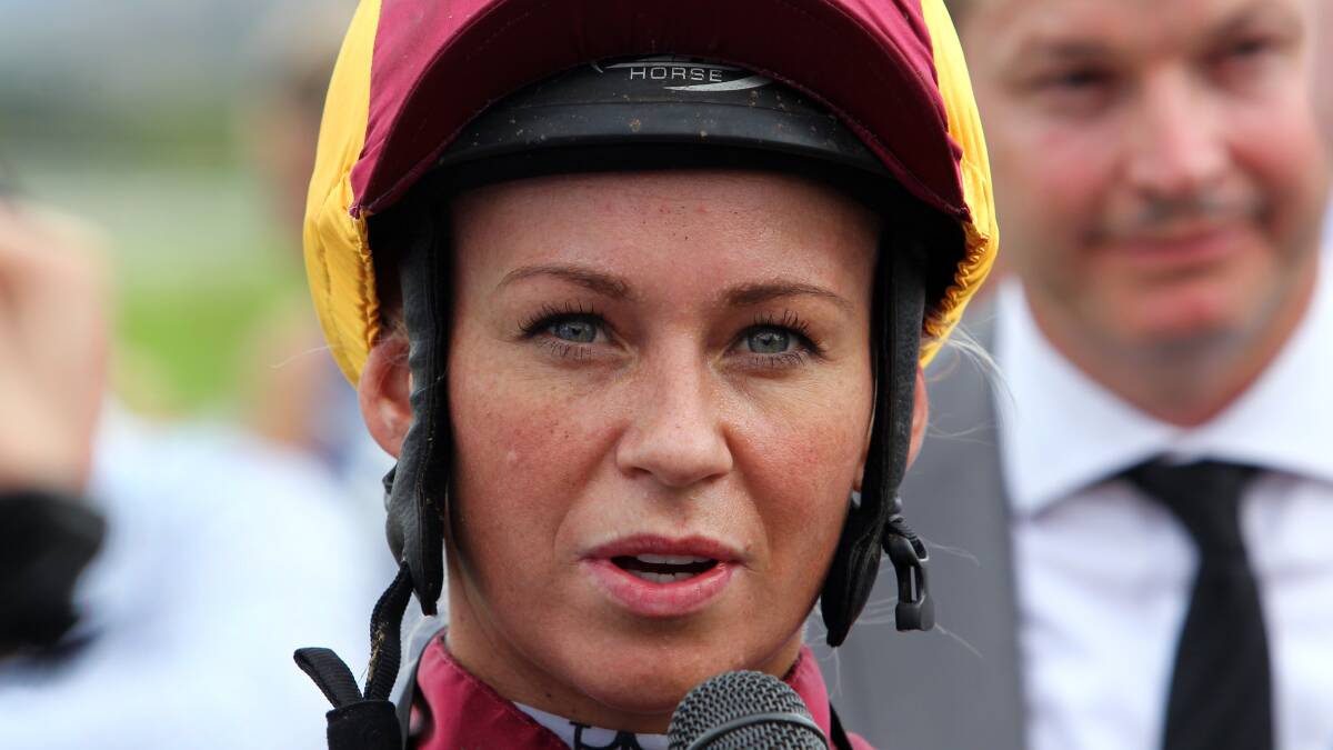 Jockey Kathy O'Hara gives an interview after riding Canny Ballad to win the Albury Gold Cup.