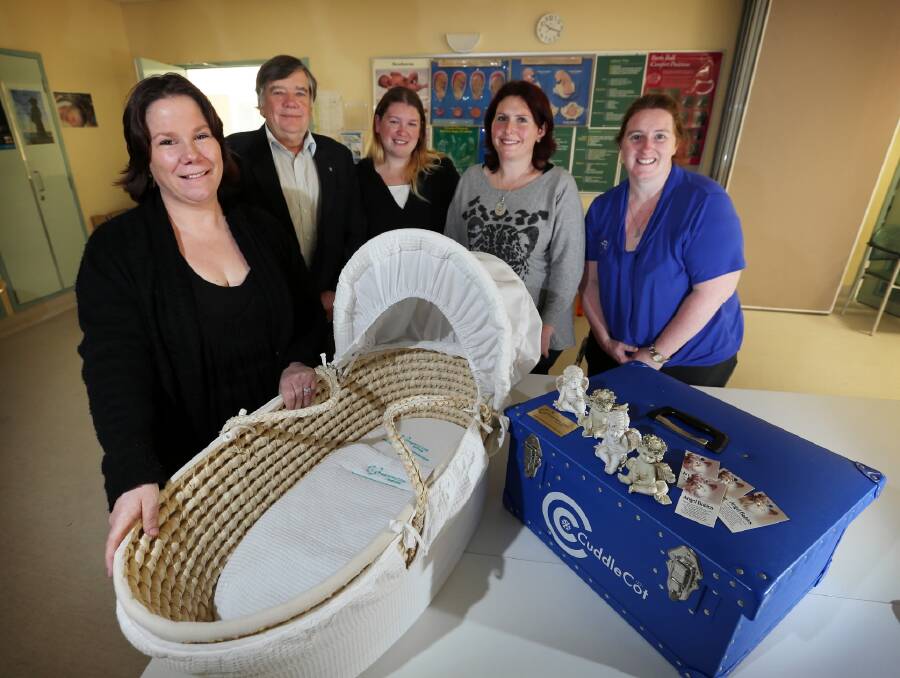 Kalina Kotzur, from Border Baby and Pregnancy Loss, Andrew Williams, Nell McLean, Sara Bayliss, and Abby Cooper, with a new cuddle cot. Picture: MATTHEW SMITHWICK