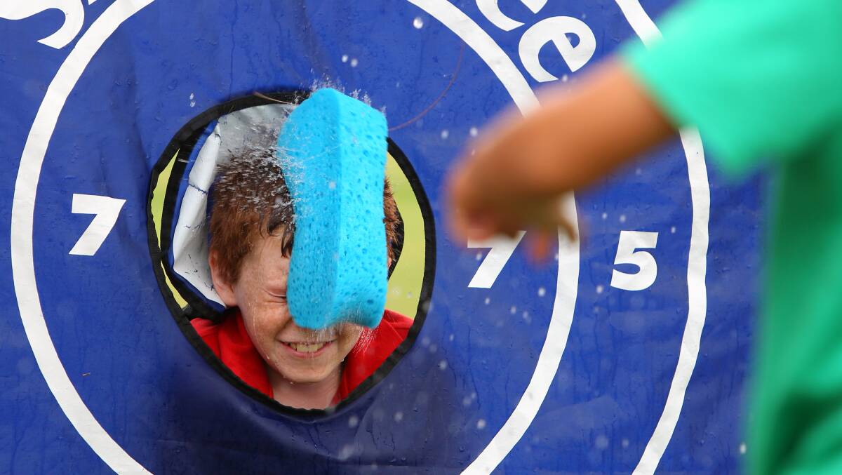  Year 5 student Hamish Sims, 10, was the target in the sponge-throw competition at Albury North Public School's water sports day. Picture: MATTHEW SMITHWICK