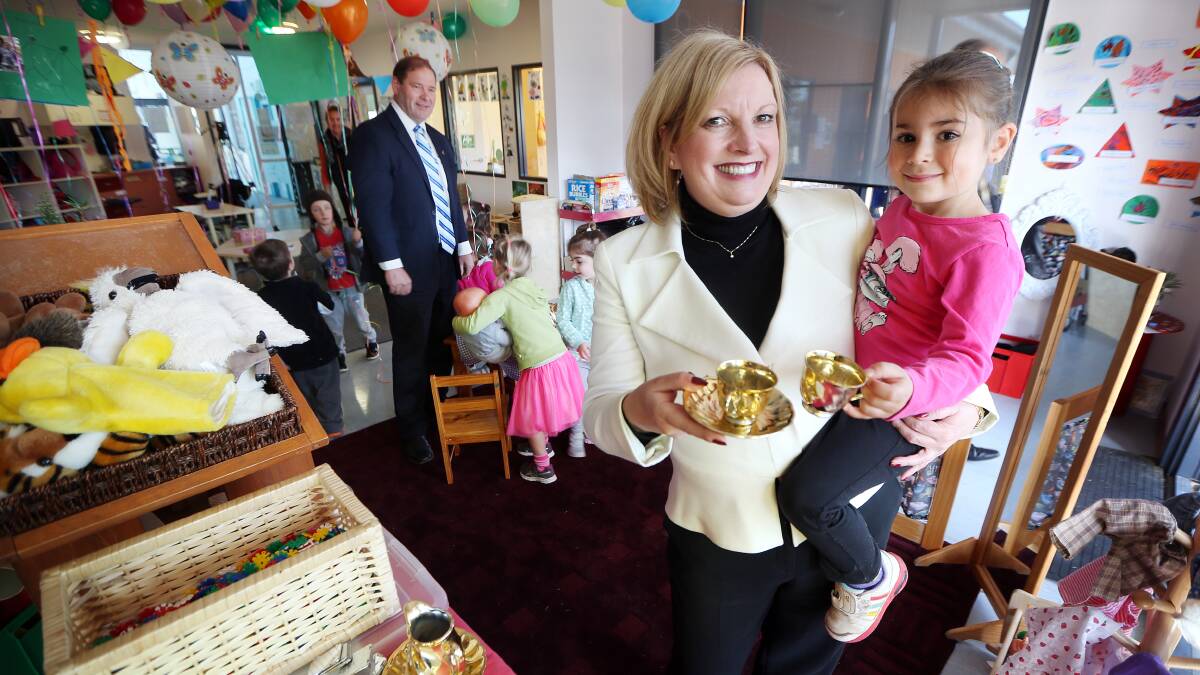 Children and Early Childhood Development Minister Wendy Lovell shares a cuppa with Grace Calvene, 4, at the opening of the new centre. Picture: JOHN RUSSELL