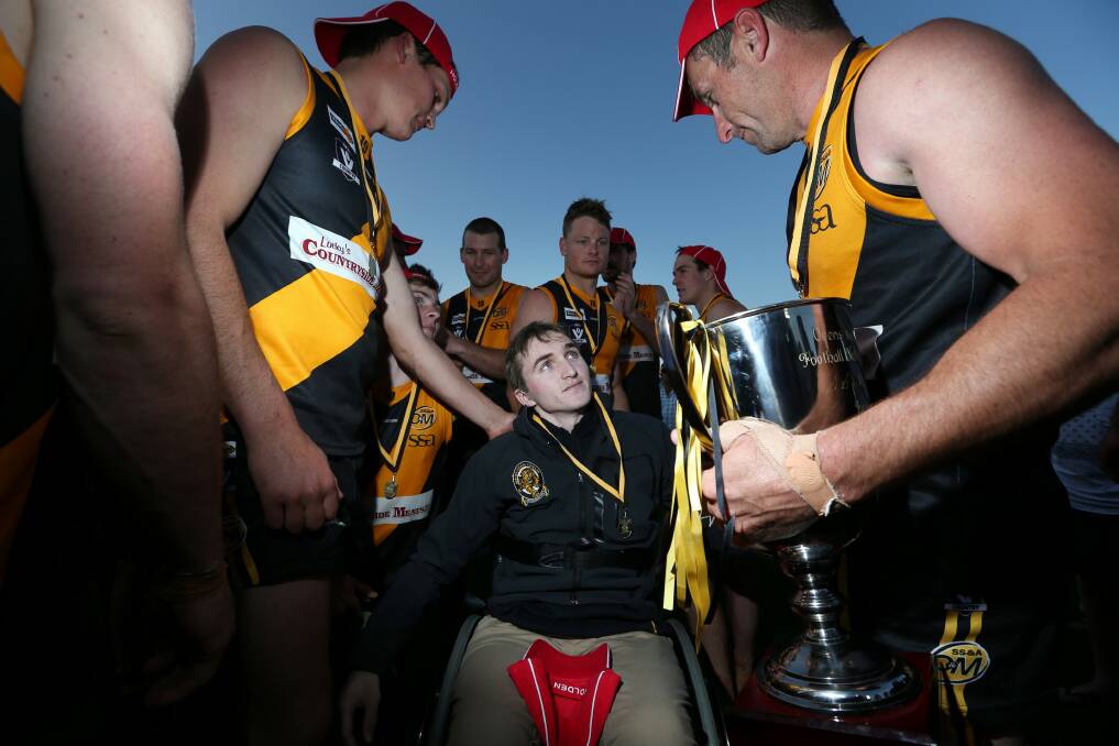 The Tigers dedicated their win to James McQuillan. Picture: MATTHEW SMITHWICK