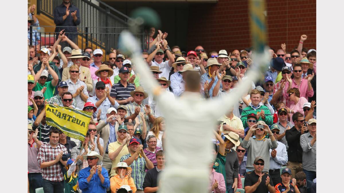 The crowd applauds as Michael Clarke of Australia reaches his century. Picture: GETTY IMAGES