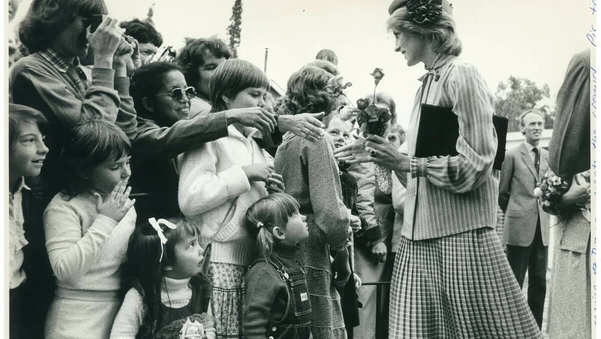 1983 - Prince Charles and Princess Diana make a royal visit to Albury. The royals visit St Matthews church, in Holbrook. Princess Diana meets the crowd just outside the church gates following the service. 