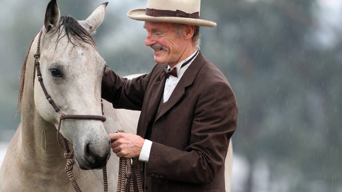 Geoffrey Graham leads Cherry the horse as he plays the character of Banjo Paterson. Pictures: KYLIE ESLER