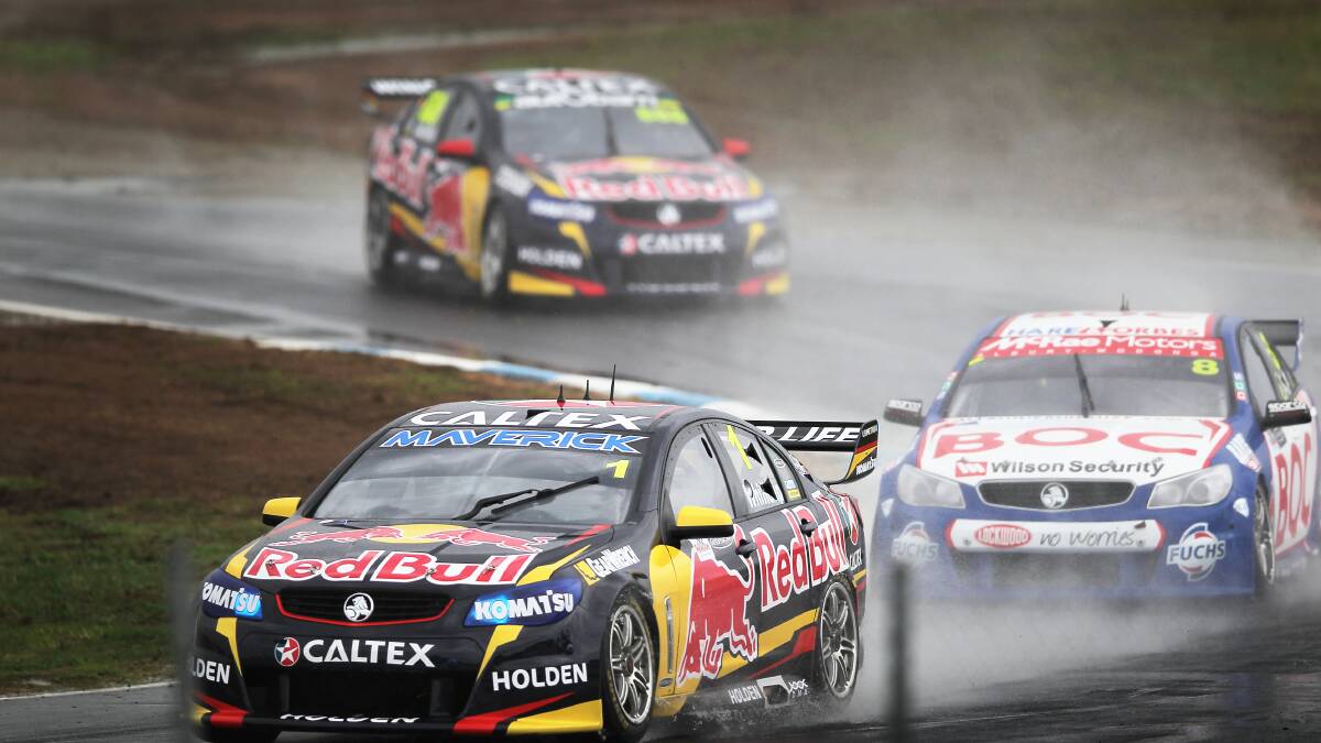Red Bull Racing Australia driver Jamie Whincup ahead of Jason Bright and team mate Craig Lowndes.