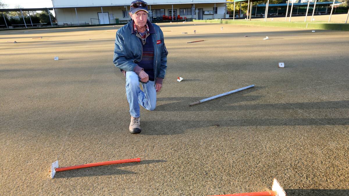 Rutherglen Bowling Club member John Crossman looks at some of the damage from yesterday’s attack. Picture: PETER MERKESTEYN