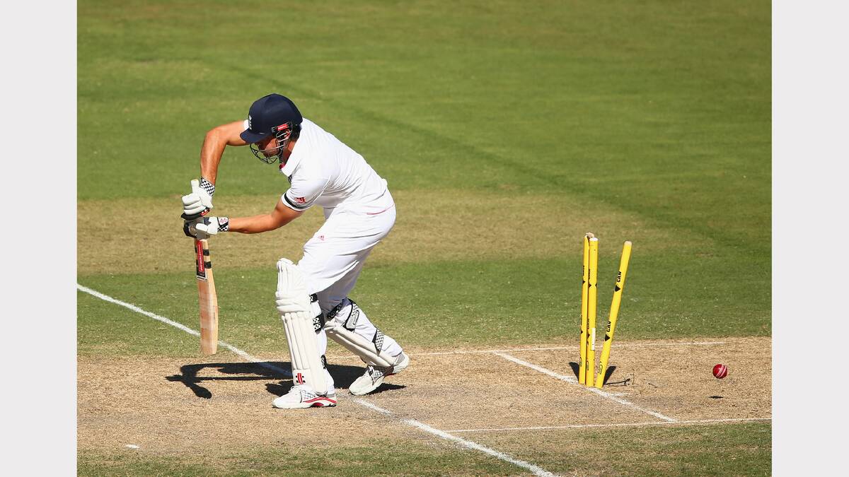 England's Alastair Cook is bowled by Australia's Mitchell Johnson. Picture: GETTY IMAGES