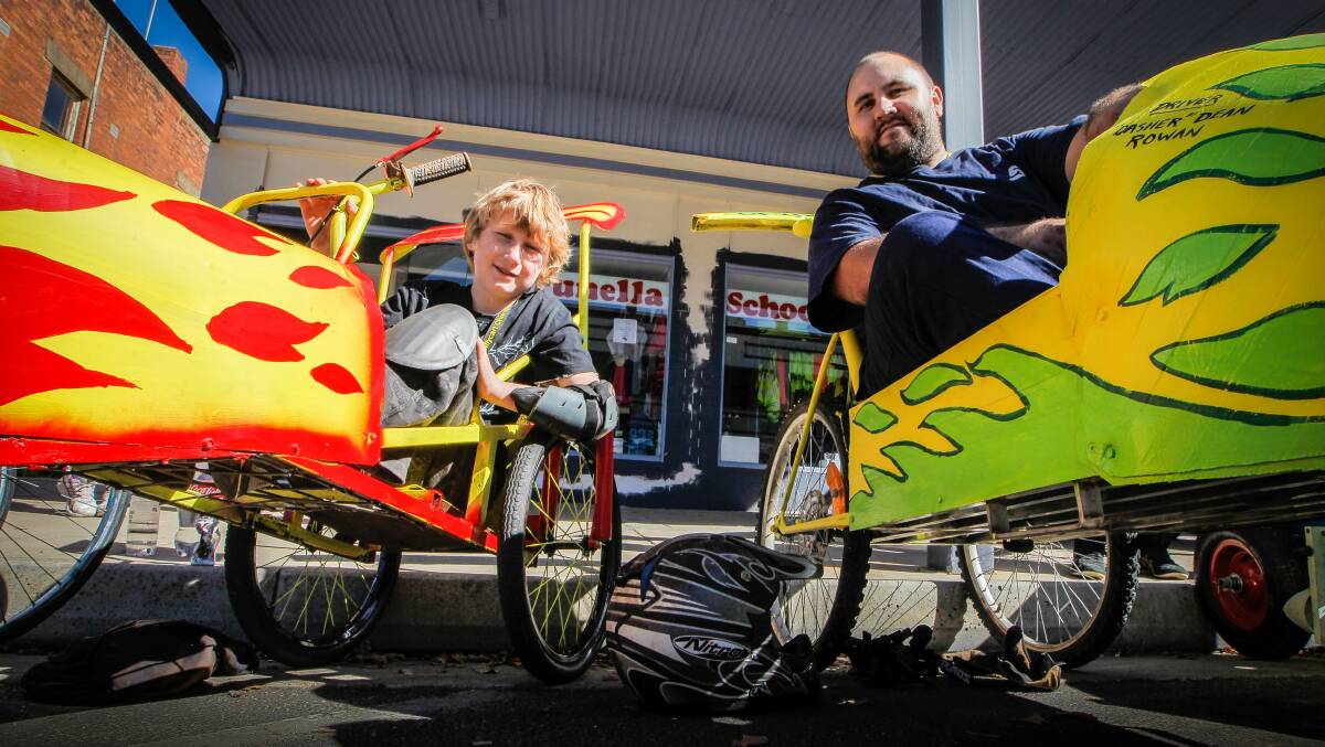 Wahgunyah's Mickey Knighton and his uncle Dean Rowan prepare to race in their hotted up billy carts. 