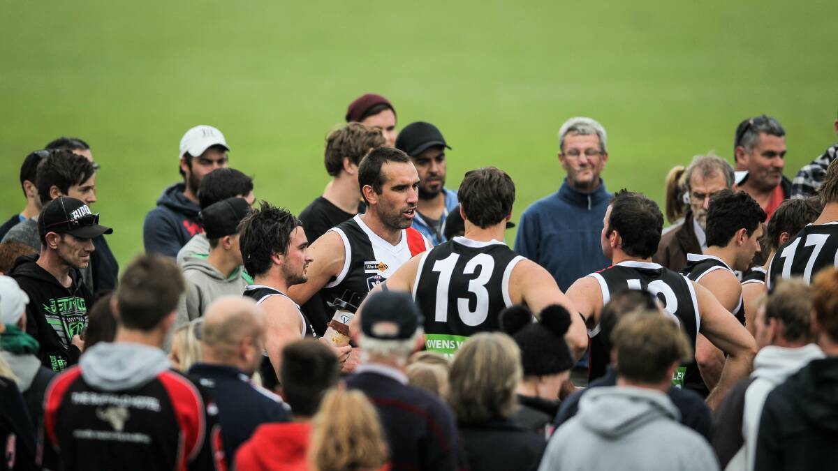 Myrtleford's Scott Lucas gathers with the team. 