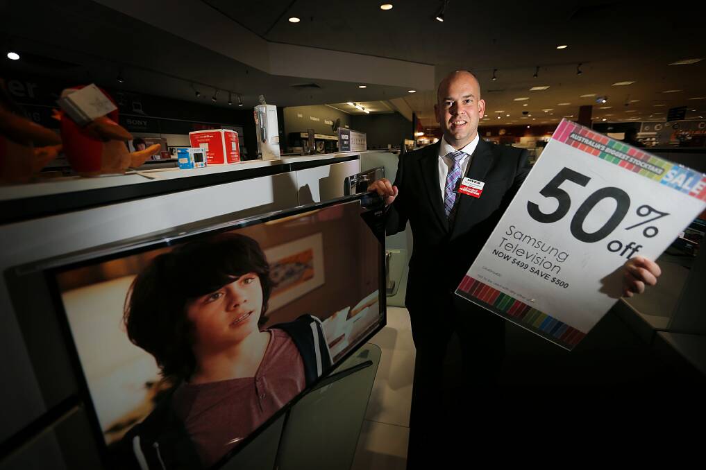 Myer store manager Paul Guilmartin with one of the hot specials available for a limited time in Albury today. Picture: TARA GOONAN
