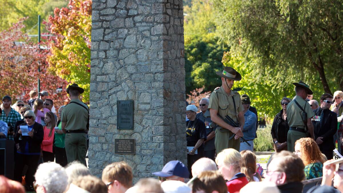 The catafalque party stands guard at the cenotaph for the Anzac Day ceremony at Mount Beauty. Picture: MATTHEW SMITHWICK