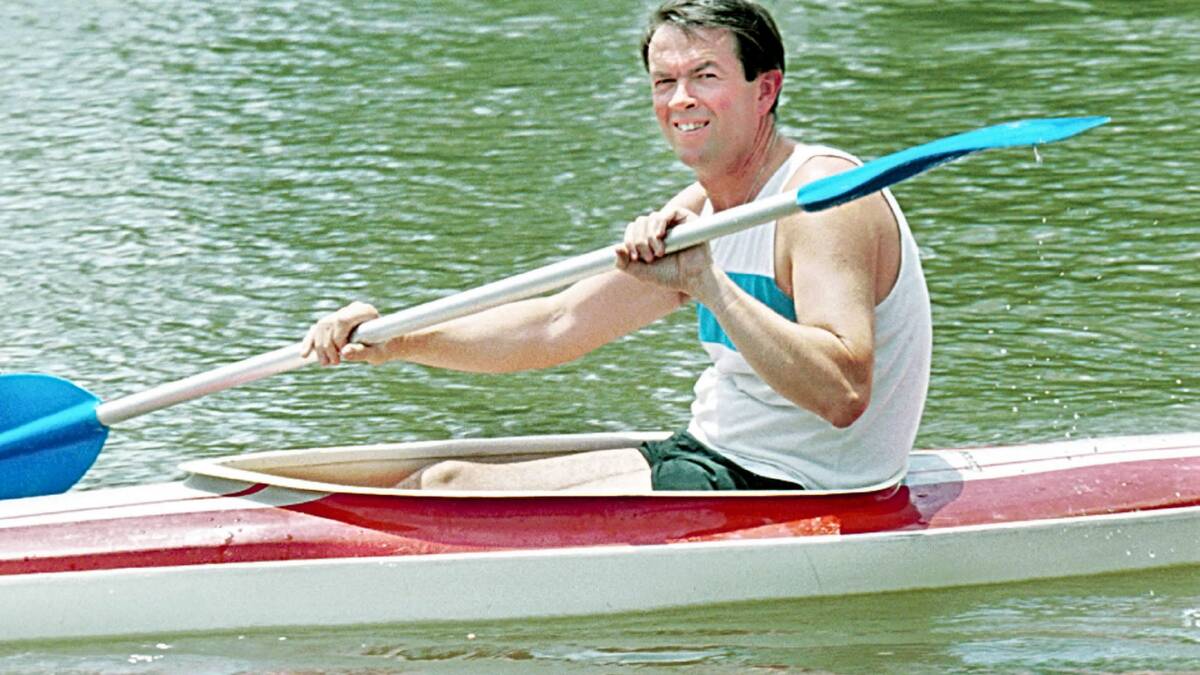 Howard Jones in his  tk1 kayak, writing a report for the Summer Daze series in 1999.