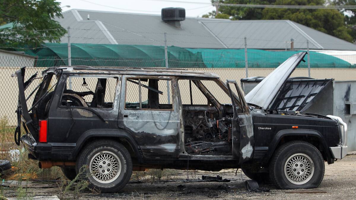 This Jeep Cherokee was burnt to a crisp at the back of North Albury factory on Tuesday night. 