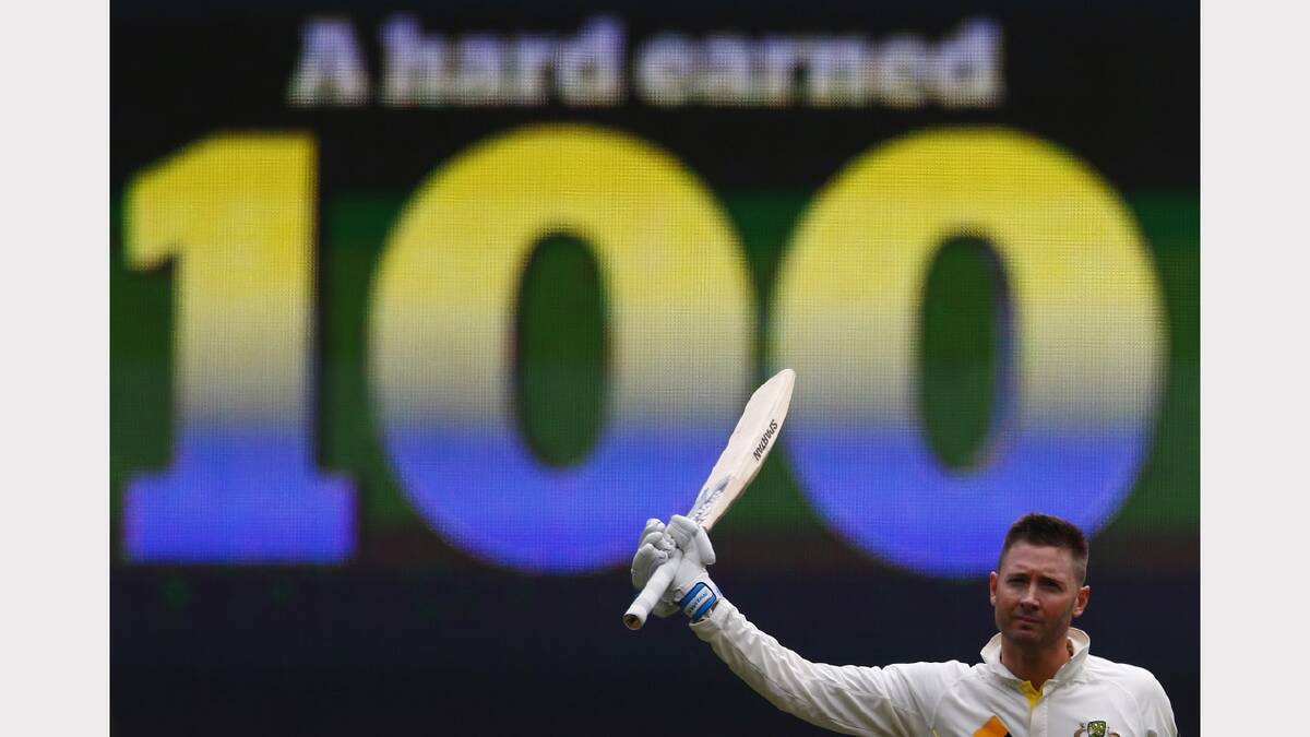 Australia's captain Michael Clarke celebrates his century . REUTERS