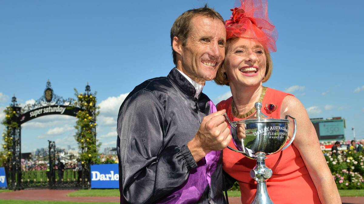 Damien Oliver and trainer Gai Waterhouse pose with the trophy after Fiorente won  the Darley Australian Cup during Australian Cup Day at Flemington Racecourse. Picture: GETTY IMAGES